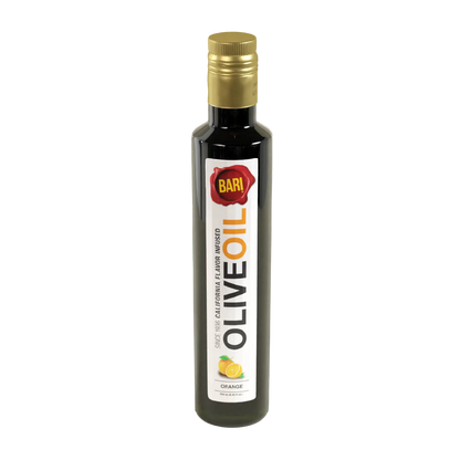 A bottle of Bari orange infused olive oil with a label showing the brand name and a graphic of an orange, indicating the flavor.