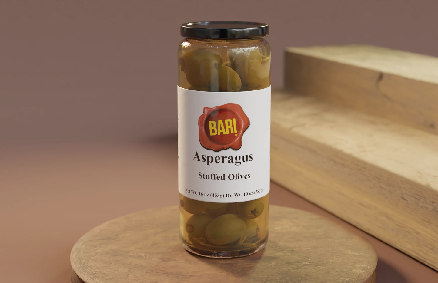 A jar of BarI Asparagus Stuffed Olives on a wooden surface.