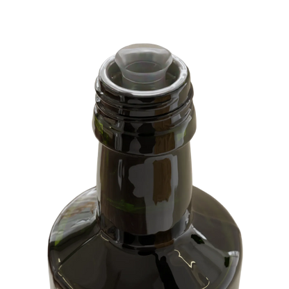 Close-up of a dark glass bottle with a translucent pour spout insert